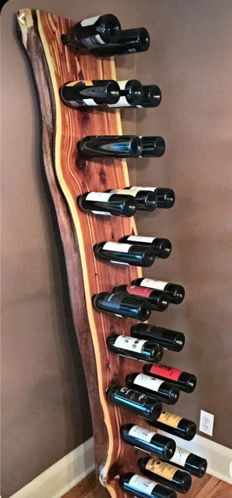 Wine holder - You cannot miss in your bar counter, a solid wood plank from Saman with live edges